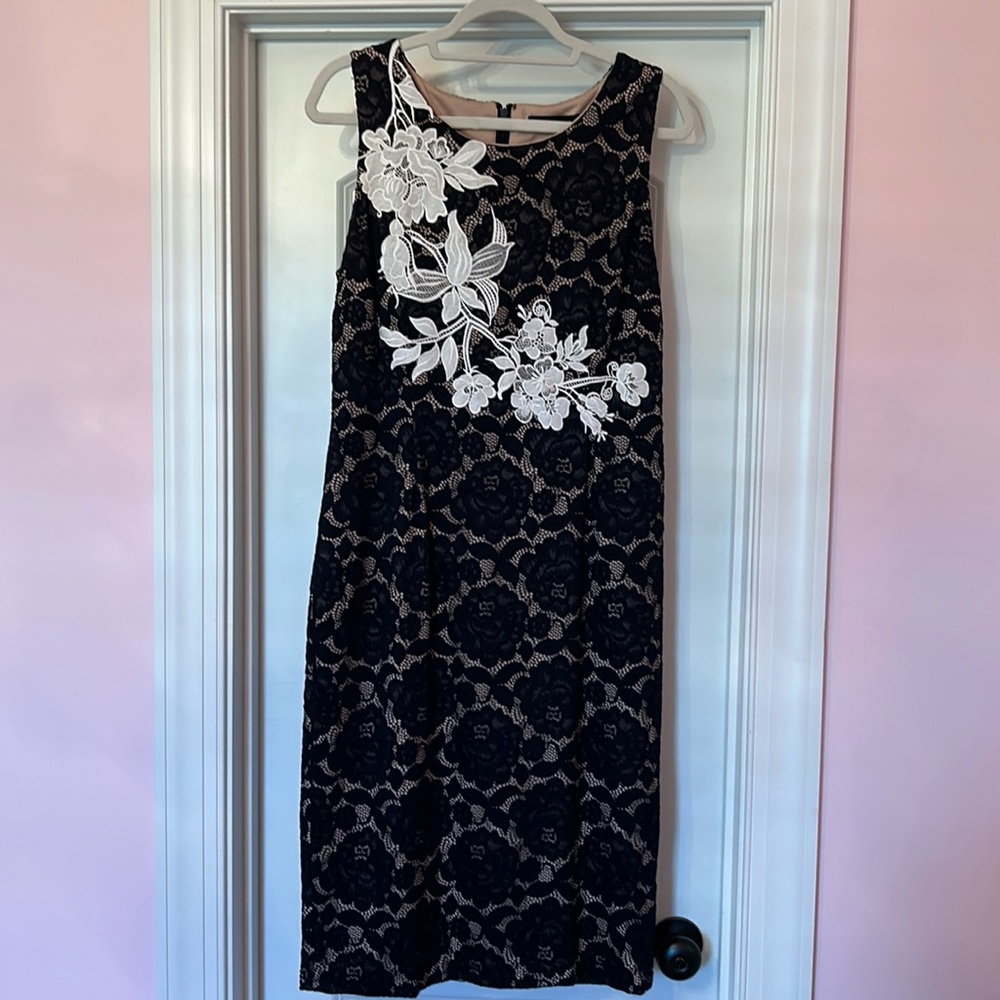 Ivanka Trump blue/white lace dress w/nude lining. Size 14.